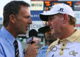 Georgia Tech Coach Chan Gailey is interviewed by ESPN at mid-field after the victory over #13 Clemson