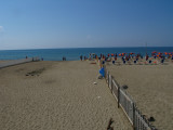 Public beach (on the left - close to the sewer) and private beach with umbrellas on the right