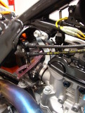 Accelerator Pump Linkage is Behind Black Cover on Cable Side