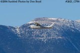 Gregory D. Eastons Cessna T210H N2234R with Pikes Peak in the background private aviation stock photo #2621
