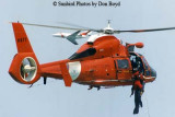 1996 - USCG HH-65 #6577 performing a hoist demonstration at the 1996 Air & Sea Show