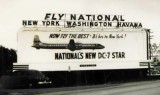 1955 - National Air Lines new DC-7 Star billboard in Miami