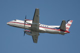 SAAB-340 in Colgan Air special livery climbing out of LGA, Sept 2007