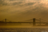 Brooklyn Bridge Under Clouds and Fog