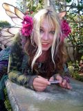 Awwwwwww, this little fairie has one of those little marble puzzles to play with