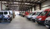 Vans inside the Sportsmobile factory