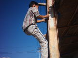 climbing the electricity pole