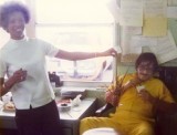 1976 - DCAD Airfield Clerk Gloria Jones trying to give Agent Armando Barreiro a red lobster