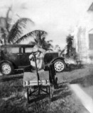 1936 - Burl Grey's younger brother in front of his dad's 1931 Graham car, 2123 NW 44 Street, Miami
