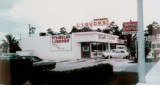 1972 - Weinkles Liquors and a Royal Castle sign at 12425 S. Dixie Highway, Miami