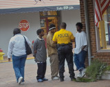 Foot patrol officer talking to teens