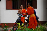 Monks with Cell and Bike