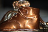 B: Bronze baby shoe