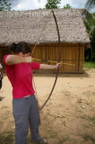 Allie tries to shoot at a coconut...