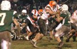 elijah runs the ball with gabe blocking