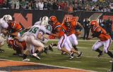 daniel hands the ball to . . .