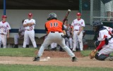 nick watches a ball in the dirt