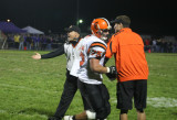 coaches congratulate offense after td