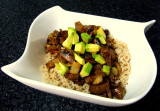cous cous w/ seitan sauteed w/brandy, cacao, cumin, roasted habenero, honey, garlic, mushrooms and pears, topped with avocado