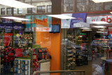Radio Shack Store Window with Street Reflections