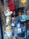 Thrift Shop Window with Reflection of MacDougal Mews