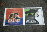Grease & Wicked Paper Ads on Park Path