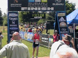 Through the finish line, the clock is 10 minutes fast because of the tri starting 10 minutes before us