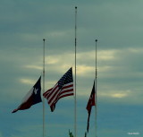 FLYING AT HALF STAFF