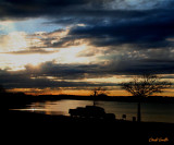 SUNET AND PARKED TRUCKS
