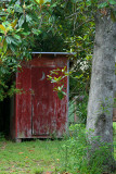 OUTHOUSE IN THE BACK YARD