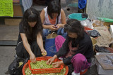 Women prepare the beans