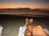 sitting on the beach enjoying the sunset