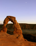 Delicate Arch at Sunset with the rising moon vertical.jpg
