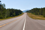 zzP1010533 Tire tracks - SanSuzEd two entrances - Highway 2 narrows - looking towards Glacier Falls.jpg