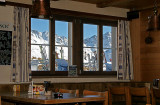 View trough a window of a moutain restaurant