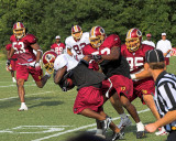 #26 Clinton Portis - Still on his feet but losing the shorts