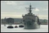 USS Comstock with Two Tugs and a Pilot Boat