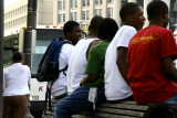 students waiting for a bus