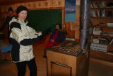 Snowshoer Sam Warming Up In Old Stehekin Log School