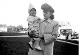 Mom holding me, Milwaukee 1942.