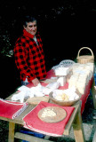Selling handmade Gamonedo cheese in Covadonga, Asturias