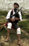 Galician piper, busking at Finisterre