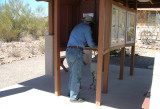 Dad phones for help at the campgrounds public phone