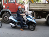 Brown Shoes and 3 Wheeled Scoot