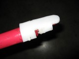 I formed a piece of high density plastic around the removal end of the tool