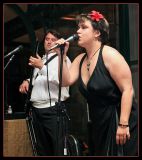 Charismatic Vocalist Sings with Groom on the Bass