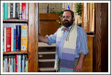 The Rabbi Enters his Office from the Sactuary