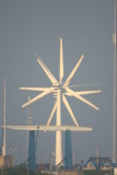 4 wind mills in line