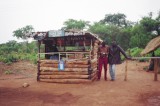 Typical roadside stand made of pine bark boards.JPG