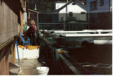 adult holding tanks pipe in corner determines water level.jpg